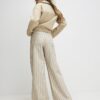 Beige randiga jeans med vida ben
