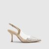Beige spetsiga pumps med klack i plexiglas