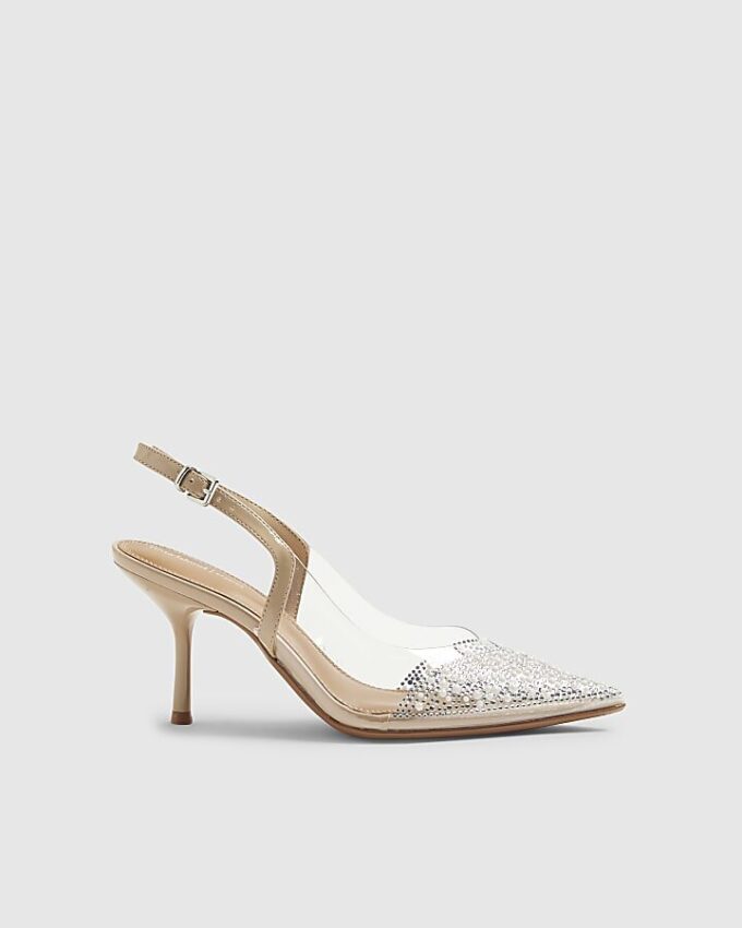Beige spetsiga pumps med klack i plexiglas