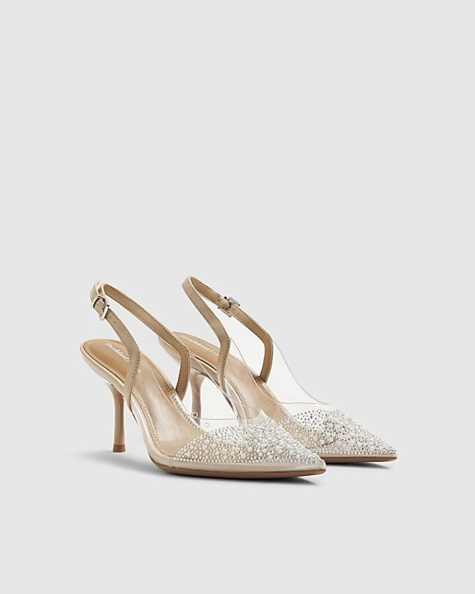 Beige spetsiga pumps med klack i plexiglas