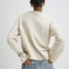Beige stickad tröja med rund hals
