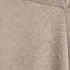 Beige stickade byxor med vida ben