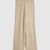 Beige stickade byxor med vida ben