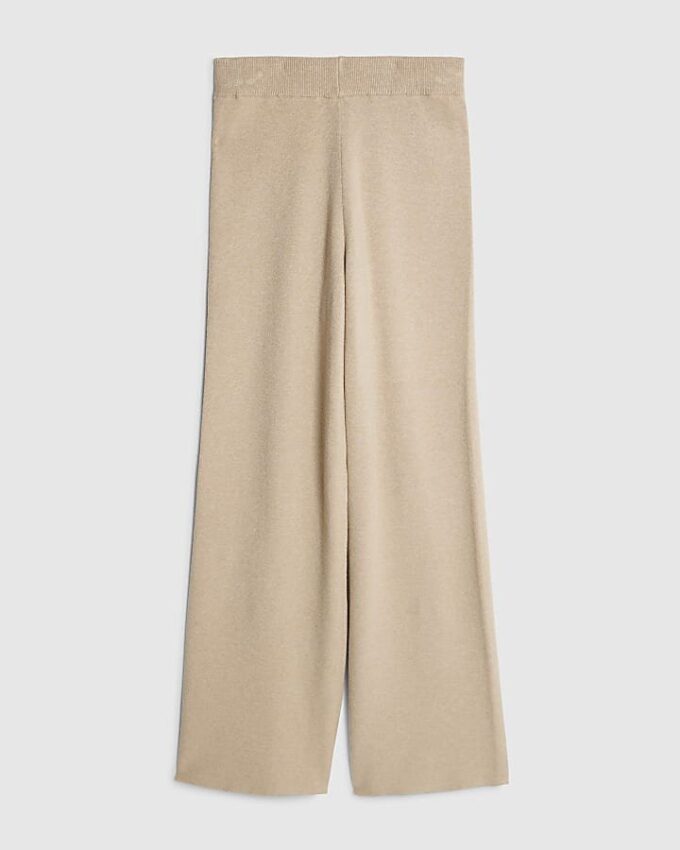 Beige stickade byxor med vida ben
