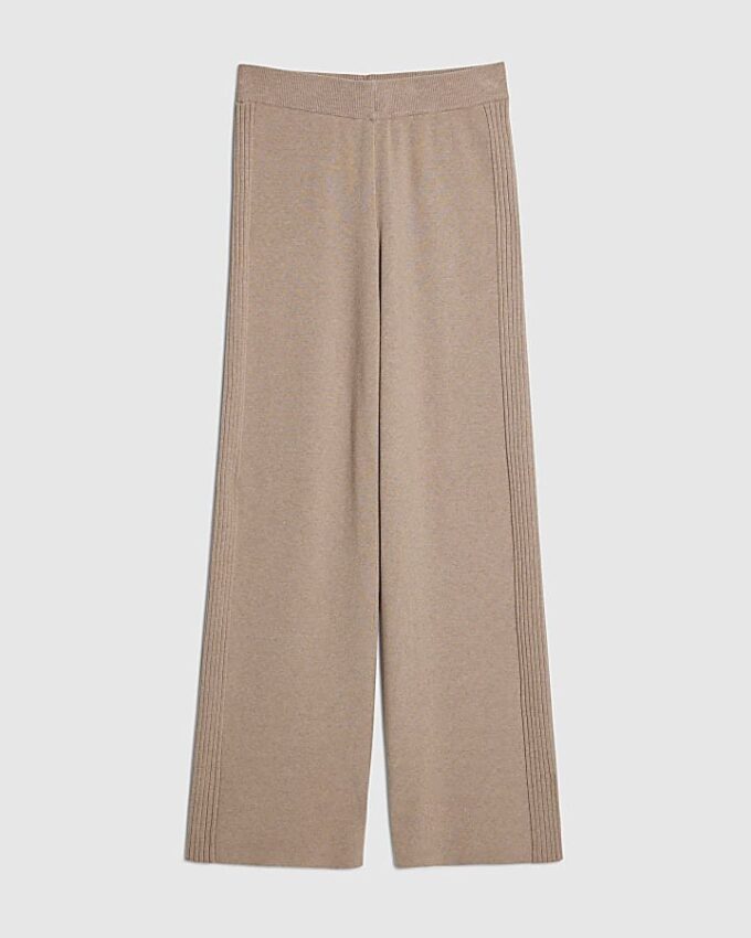 Beige stickade byxor med vida ben och ribbade benslut