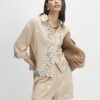 Beige strandshorts med paljetter