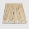 Beige strandshorts med paljetter