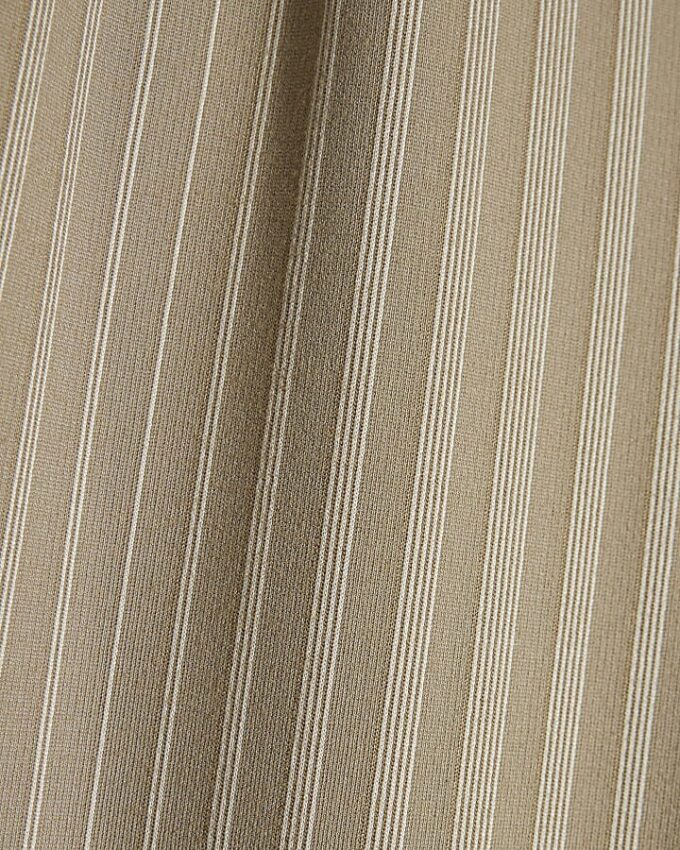 Beige stretchiga randiga byxor med vida ben