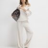 Beige sweatshirt med utskurna axlar