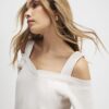 Beige sweatshirt med utskurna axlar