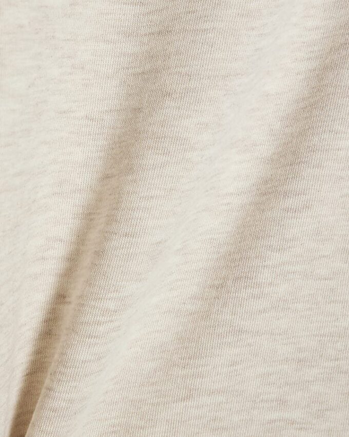 Beige sweatshirt med utskurna axlar
