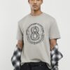 Beige T-shirt med normal passform 8