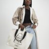 Beige totebag med ficka fram