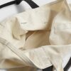 Beige totebag med ficka fram