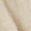 Beige tröja med huva och kontrasterande detaljer