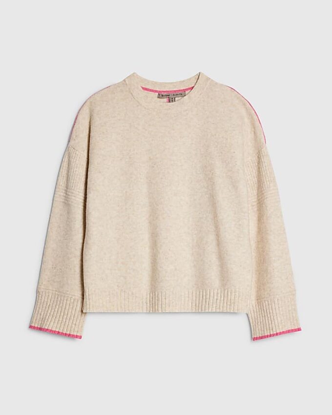 Beige tröja med kontrasterande detaljer