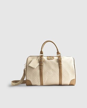 Beige väska med spänne och monogram