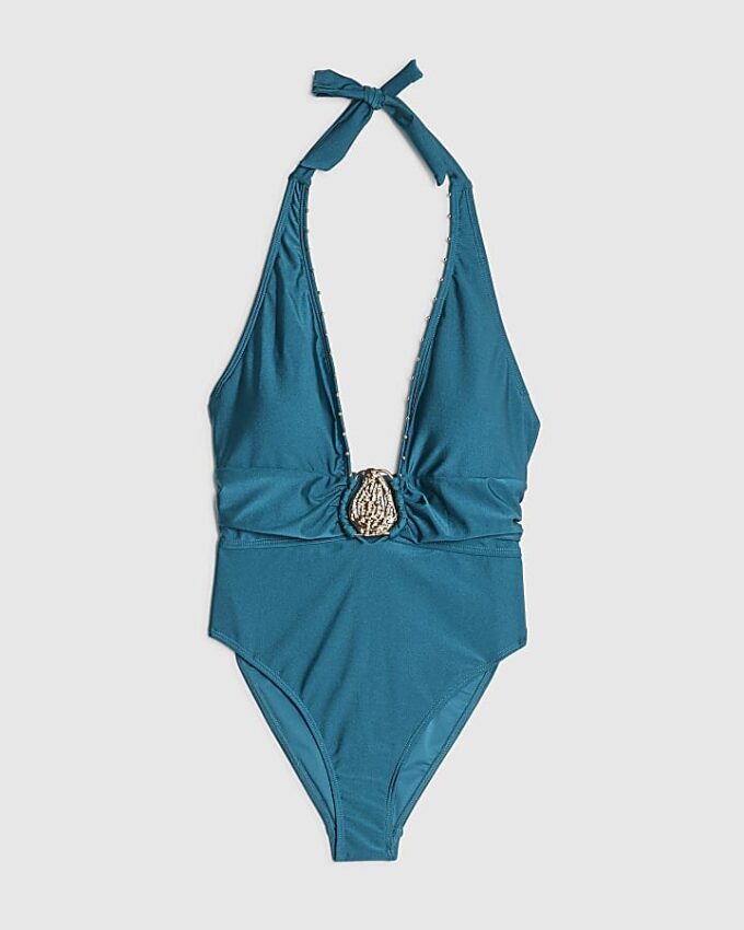 Blå baddräkt med nackband och nitar