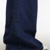 Blå baggy jeans med plissering och bälte