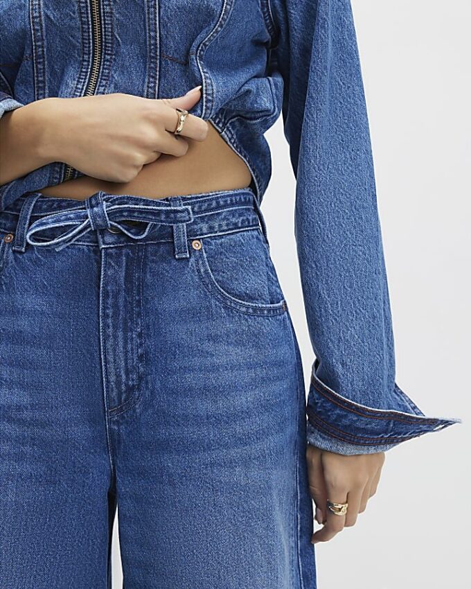 Blå baggy jeans med vida ben och knytmidja