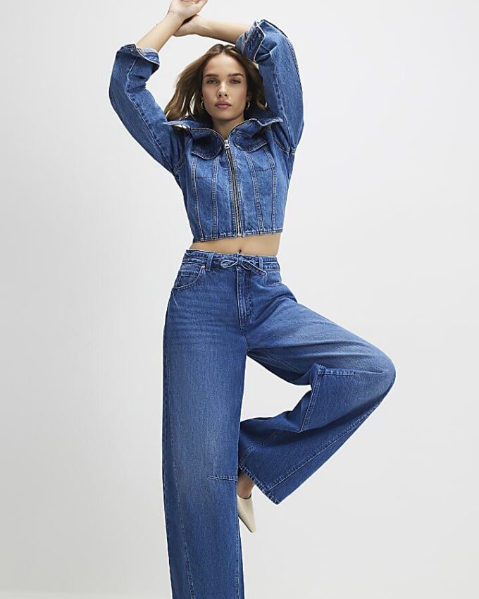 Blå baggy jeans med vida ben och knytmidja
