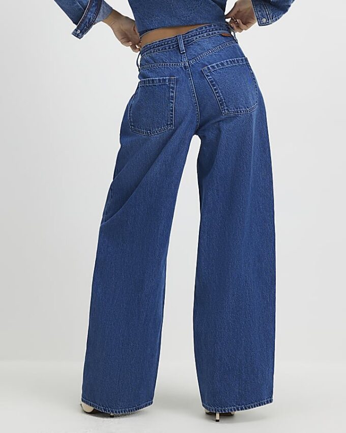 Blå baggy jeans med vida ben och knytmidja