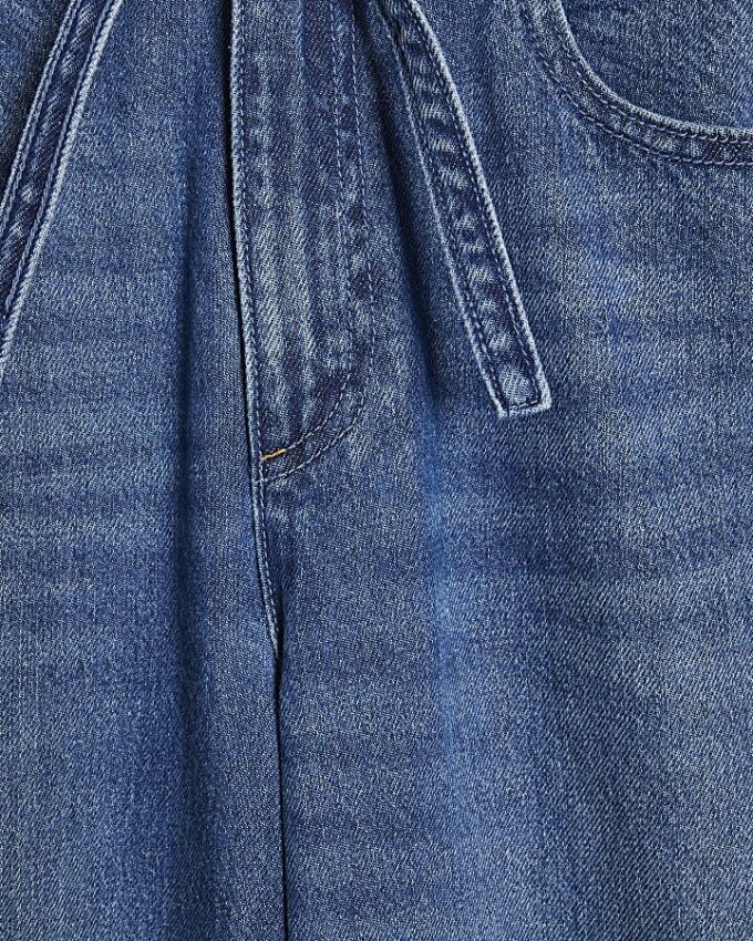 Blå baggy jeans med vida ben och knytmidja