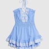 Blå broderad playsuit med volanger