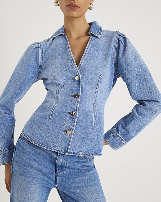Blå denimjacka med långa puffärmar