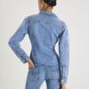 Blå denimjacka med långa puffärmar