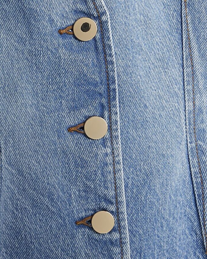 Blå denimjacka med långa puffärmar
