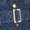 Blå denimtop utan ärmar med monogram och bälte