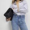 Blå högmidjade avslappnade flare-jeans