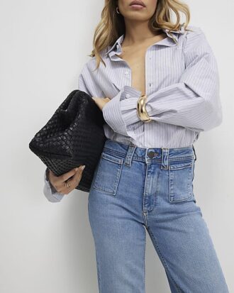Blå högmidjade avslappnade flare-jeans