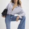 Blå högmidjade avslappnade flare-jeans