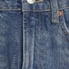 Blå jeans med breda ben och rå kant Blå jeans med breda ben och rå kant
