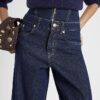 Blå jeans med dubbel midja och vida ben