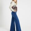 Blå jeans med hög midja och mjuka vida ben