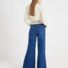 Blå jeans med hög midja och mjuka vida ben