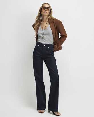 Blå jeans med medelhög midja och bootcut