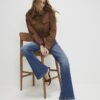 Blå jeans med medelhög midja och bootcut