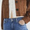 Blå jeans med sömmar och barellben Blå jeans med sömmar och barellben
