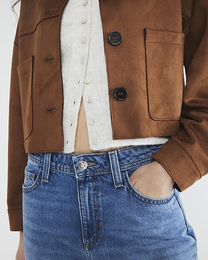 Blå jeans med sömmar och barellben Blå jeans med sömmar och barellben