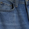 Blå jeans med sömmar och barellben Blå jeans med sömmar och barellben