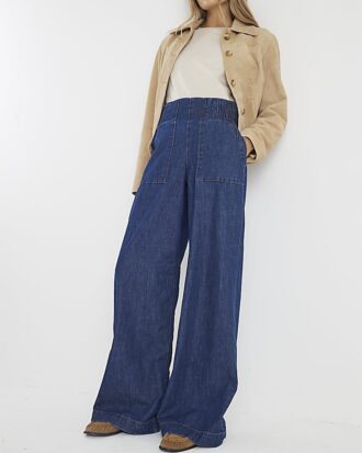 Blå jeans med vid ben och resår i midjan