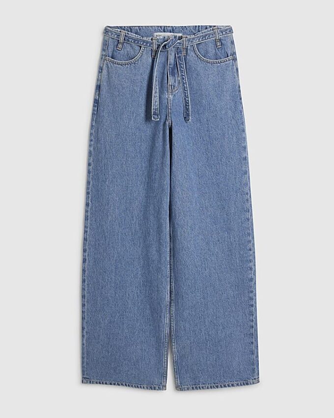 Blå jeans med vida ben och knytning fram