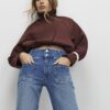 Blå knappdetaljer på fickorna Framåtvidgade jeans
