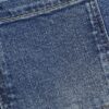 Blå knappdetaljer på fickorna Framåtvidgade jeans