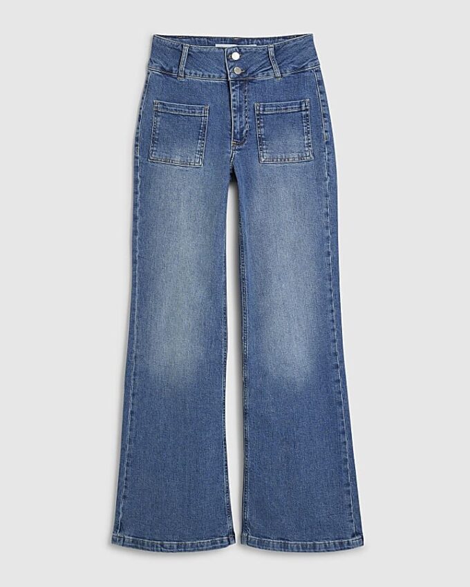 Blå knappdetaljer på fickorna Framåtvidgade jeans