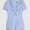 Blå kortärmad playsuit med spetsar